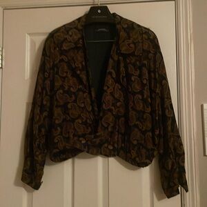 Paisley print lightweight 100 % silk size medium.. worn twice